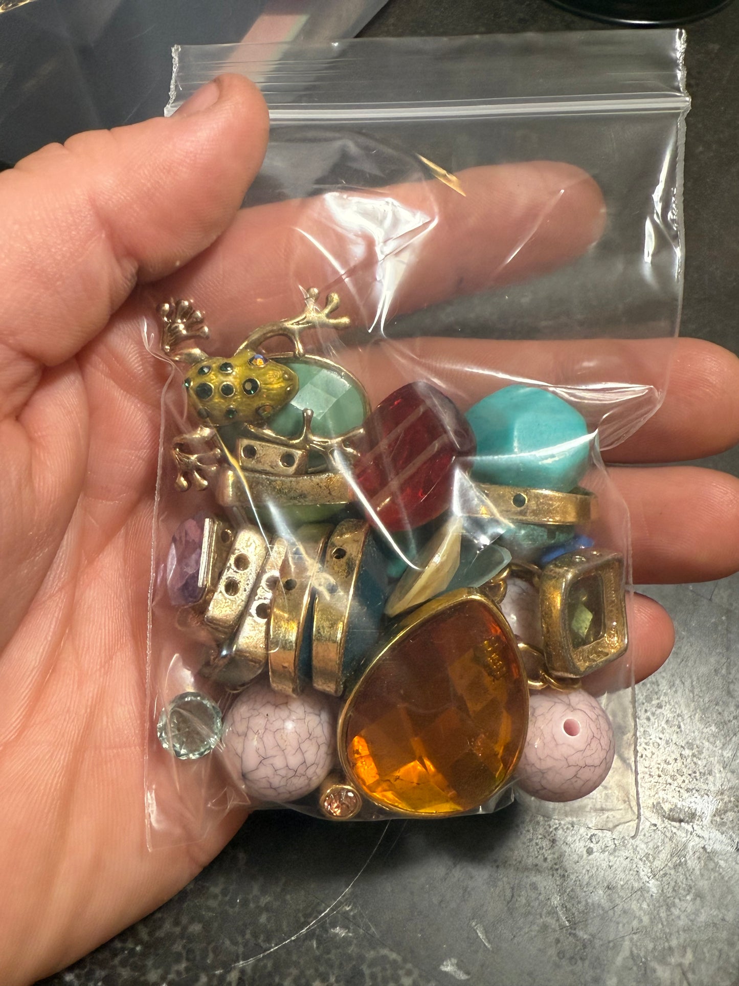 Small bag of vintage jewelry parts (tray not included)