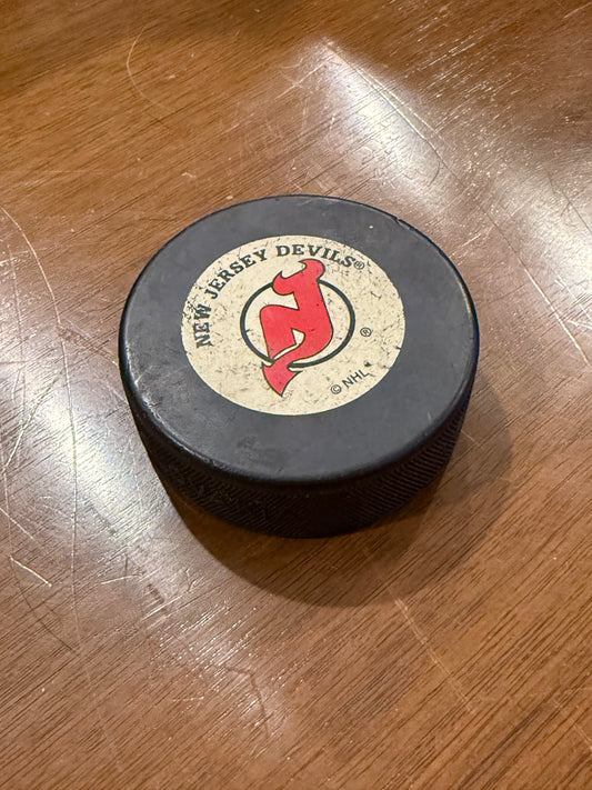 Vintage New Jersey Devils used NHL Hockey Puck